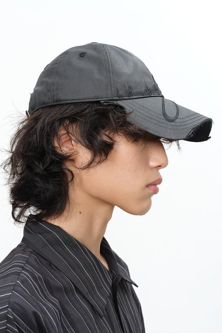 Waxed Embroidered Peaked Cap